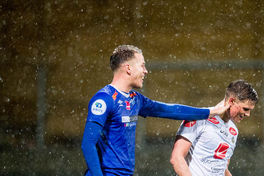 Michael Karlsen of Ranheim and Bjørn Inge Utvik of Sogndal