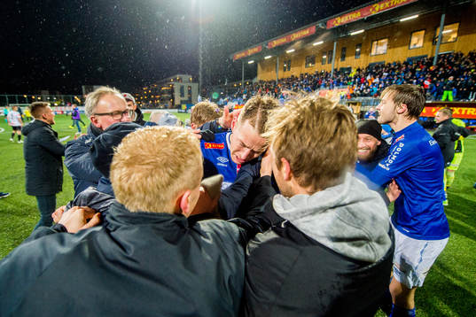 Michael Karlsen of Ranheim celebrates with teammates being