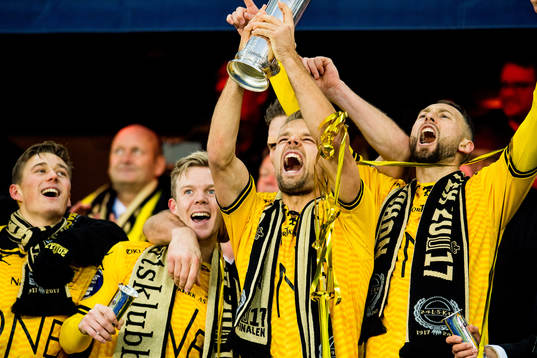Mats Haakenstad of Lillestrøm lifts the cup trophy