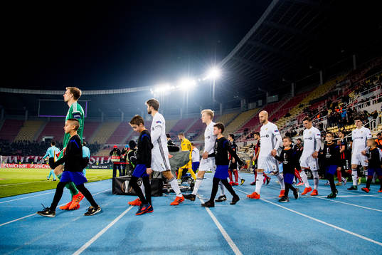 The Rosenborg players enter the pitch