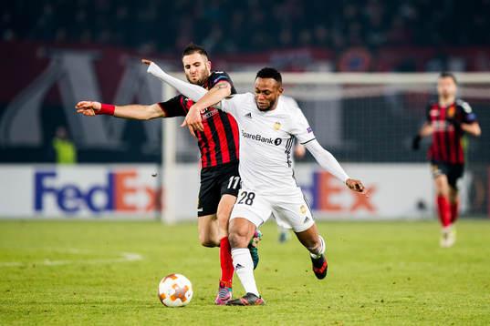 Tigran Barseghyan of FK Vardar and Samuel Adegbenro of