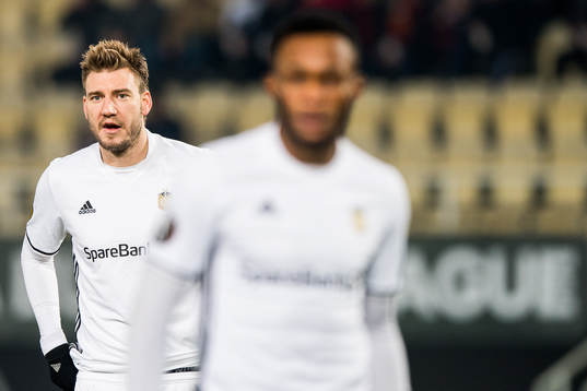 Nicklas Bendtner and Samuel Adegbenro of Rosenborg