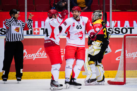 Zbynek Irgl and Tomas Marcinko of Ocelari Trinec celebrates