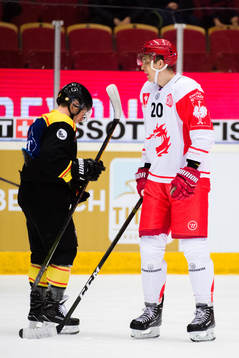 Kevin Clark of Brynäs and Lukas Kovar of Ocelari Trinec