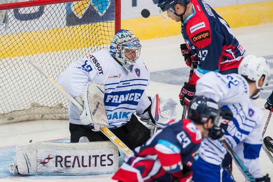 Goaltender Florian Hardy of France and Tomas Surovy of