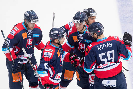 Tomas Surovy of Slovakia celebrates with his teammates