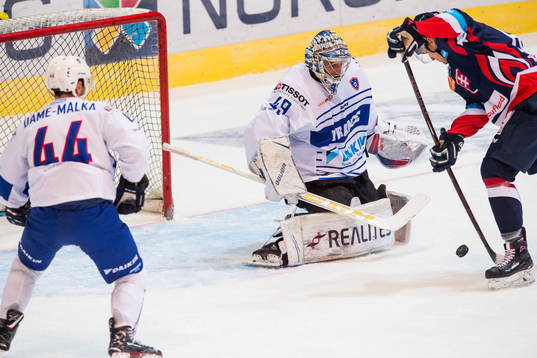 Goaltender Florian Hardy of France and Matej Paulovic of
