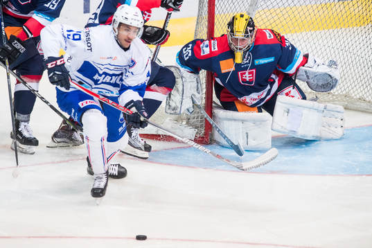 Rudy Matima of France and Goaltender Denis Godla of Slovakia