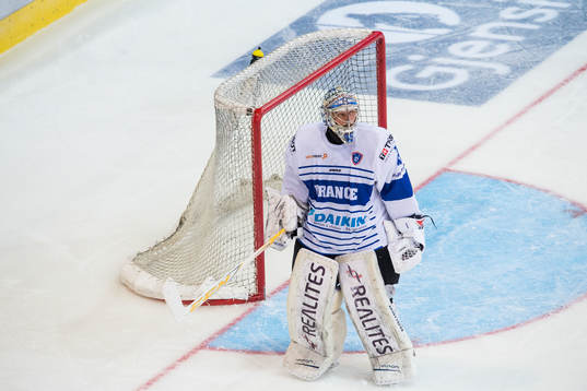 Goaltender Florian Hardy  of France looks dejected