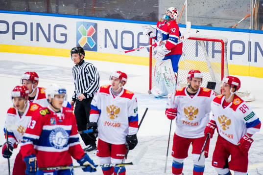 Goaltender Henrik Haukeland of Norway looks dejected
