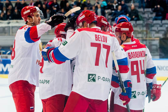 Vladimir Tkachyov of Russia celebrates with his teammates
