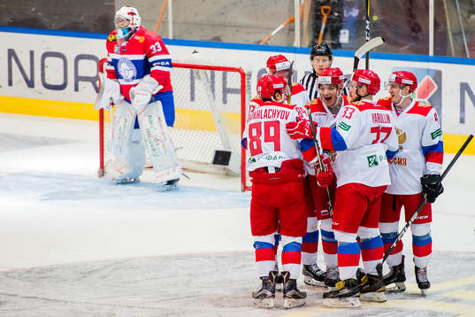 Mikhail Naumenkov of Russia celebrates with his teammates