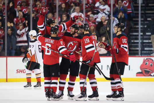 Devils Andy Greene, Brian Boyle, Stefan Noesen, Travis