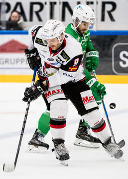 Malmö Redhawks Frederik Storm och Rögles Craig Schira
