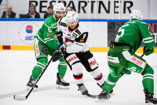 Malmö Redhawks Frederik Storm mot Rögles Craig Schira och