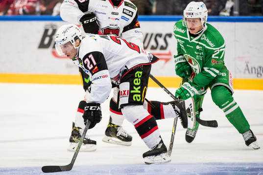Malmö Redhawks Andy Miele och Rögles Jesper Williamsson