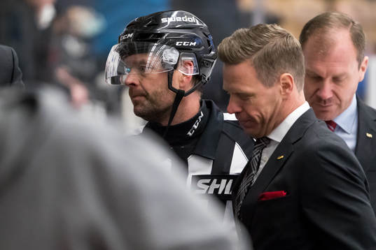 s tränare Johan Lindbom och domare Patrik Sjöberg i