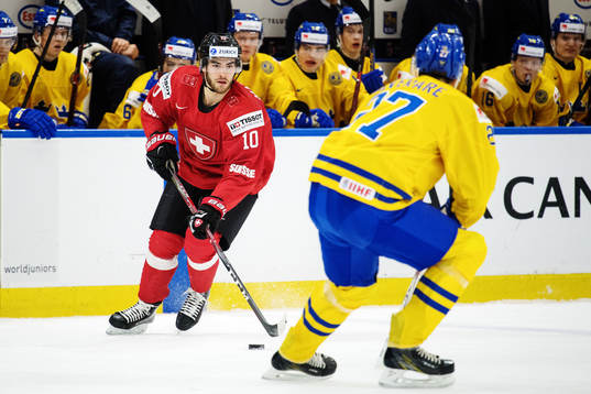 Schweiz Guillaume Maillard med pucken