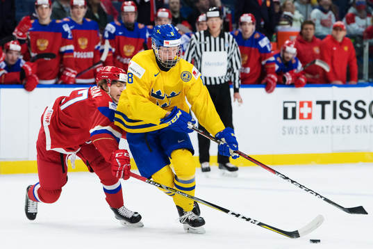 Rysslands Alexei Polodyan och Sveriges Rasmus Dahlin