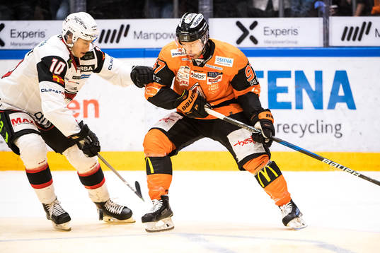 Malmö Redhawks Robin Alvarez  och Karlskronas Per Ledin