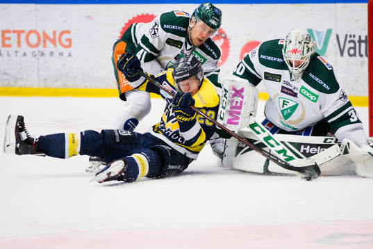Färjestads Ilari Melart och målvakt Lars Haugen