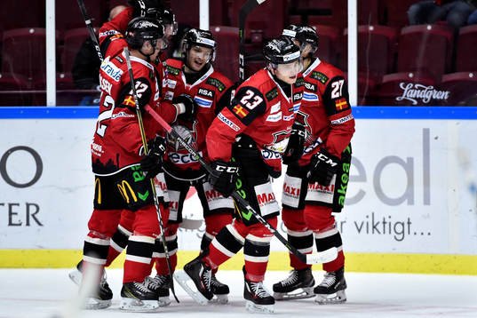Malmö Redhawks Johan Olofsson jublar med Stefan Warg,
