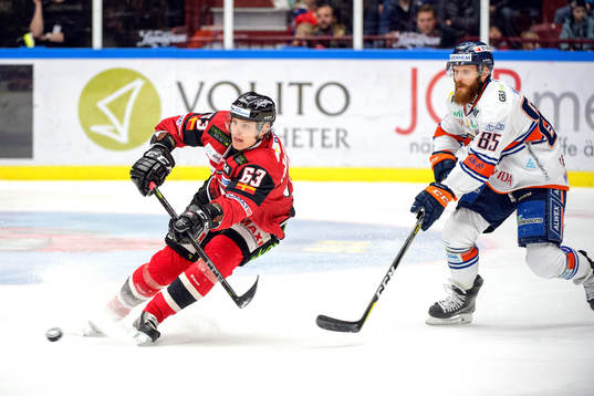 Malmö Redhawks Fredrik Händemark och Växjös Liam Reddox