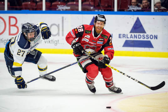 s David Gustafsson och Malmö Redhawks Jens Olsson