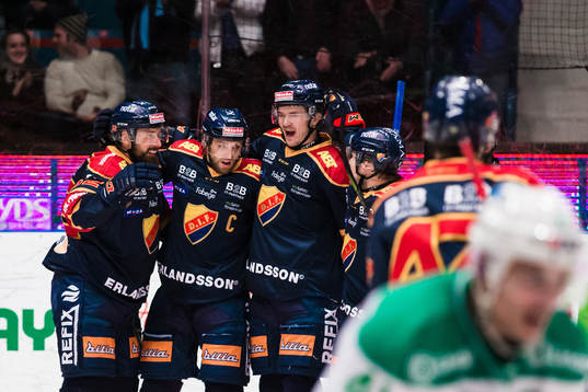 Djurgårdens Calle Ridderwall jublar med Mikael Ahlén och