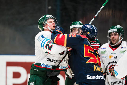 Djurgårdens Mikael Ahlén och Frölundas Adam Pardy i ett