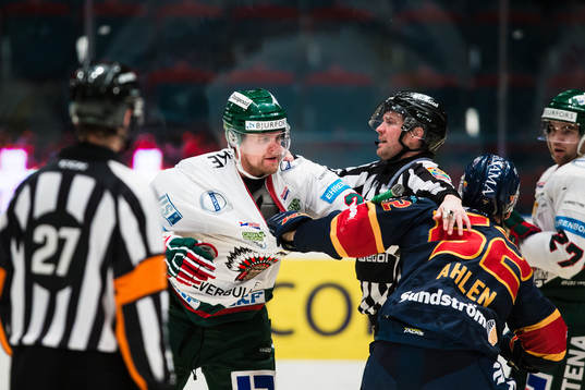 Djurgårdens Mikael Ahlén och Frölundas Adam Pardy i ett
