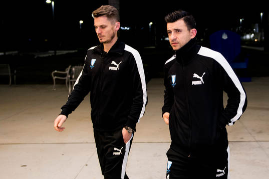 Malmö FFs Markus Rosenberg och Behrang Safari ankommer