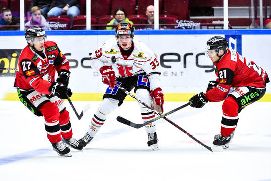 Malmö Redhawks Daniel Zaar och Andy Miele i en kamp mot
