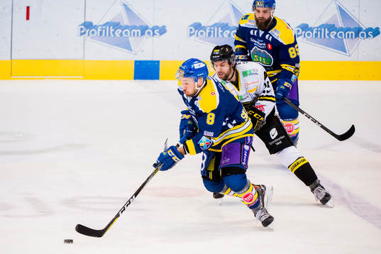 Eirik Skadsdammen of Storhamar and William Papuzzi of