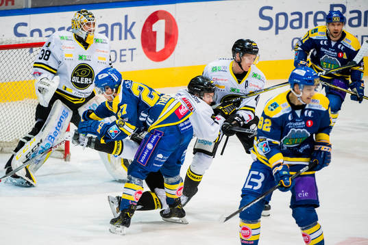 Steffen Thoresen of Storhamar and Spencer Humphries of