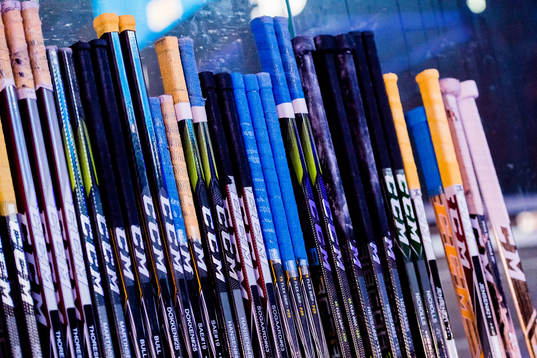 Hockey sticks lined up