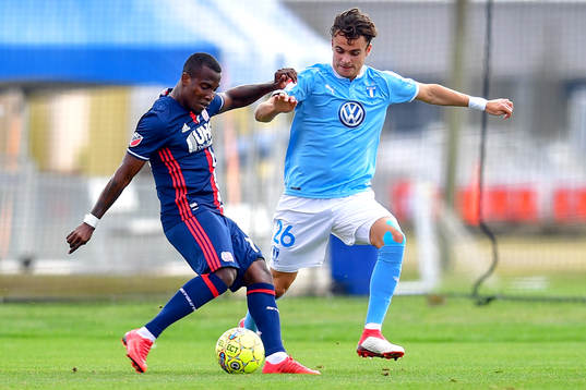 New Englands Brian Wright och Malmö FFs Andreas Vindheim