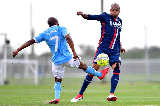 Malmö FFs Fouad Bachirou och New Englands Teal Bunbury