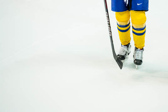 The feet of a Swedish player