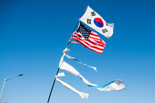 The flags of South Korea and the United States is seen