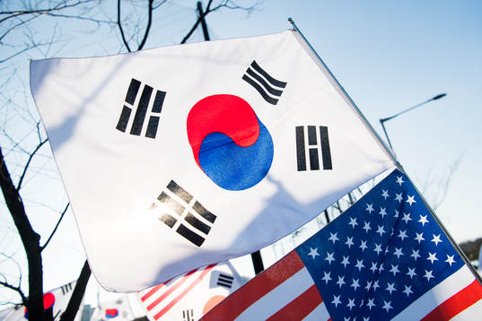 The flags of South Korea and the United States is seen