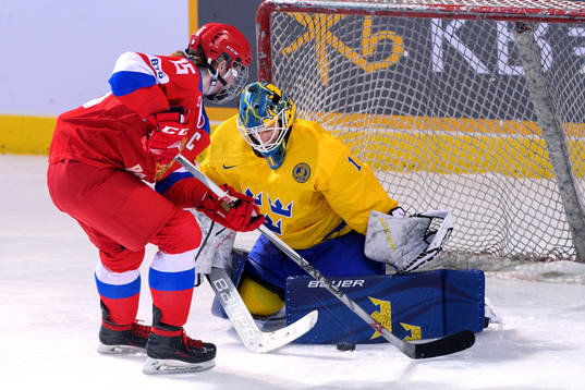 Goaltender Sara Grahn of Sweden saves a penalty  shot from