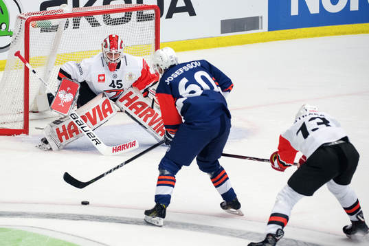 Erik Josefsson of Växjö with the puck in front of Juho