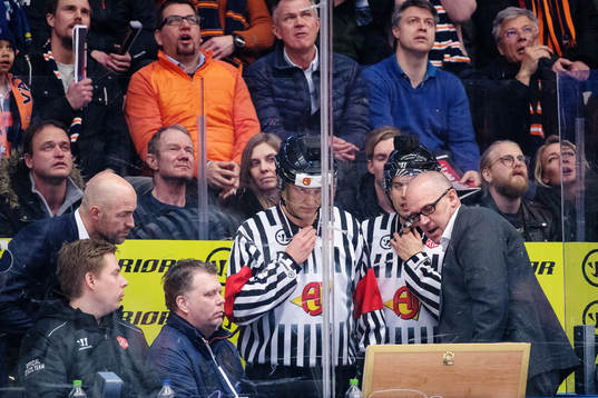 The referees awaits the results of the video analysis