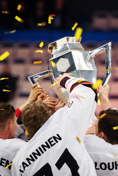 Jyväskyläs players celebrate with the trophy