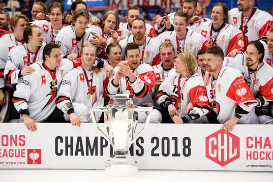 Jyväskyläs players poses for a picture as they celebrate