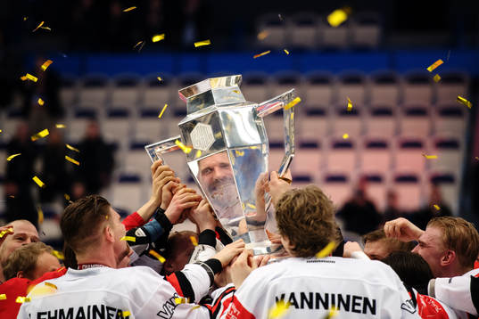 Jyväskyläs players celebrate with the trophy
