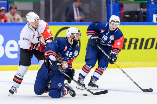 Daniel Rahimi of Växjö takes a fall in a fight for the