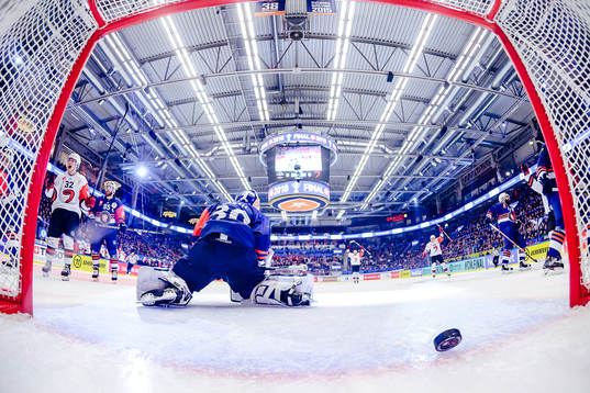 Joonas Nättinen of Jyväskyläs (not in picture) scores