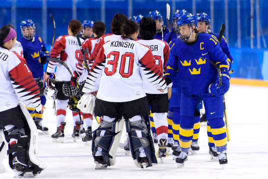 Emilia Ramboldt of Sweden tankes the Japanese players